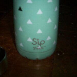 Sip by Swell Mint Green with White & Black Triangle Water Hydration Bottle, used